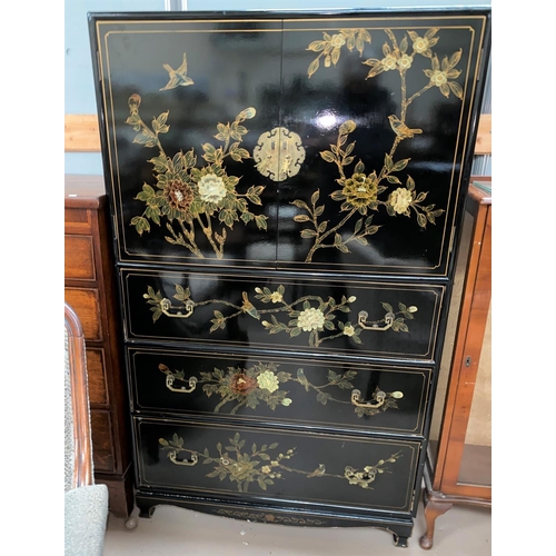 497 - A 20th century black lacquer Chinese style side cabinet with cupboard above and 3 drawers below deco... 