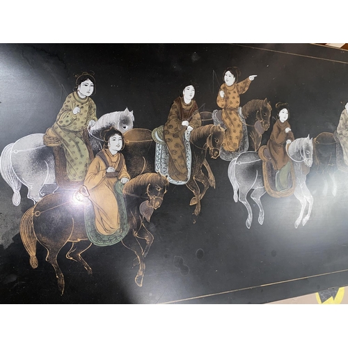499 - A 20th century Chinese style rectangular coffee table decorated with females on horseback