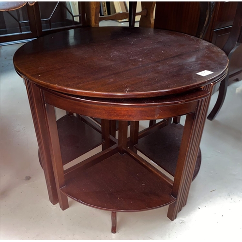 507 - A mahogany nest of 4 tables comprising coffee table with circular top and 4 quarter tables; a 1960's... 