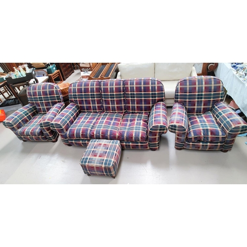 539 - A three piece suite comprising: A three seater settee and two armchairs, upholstered in tartan fabri... 