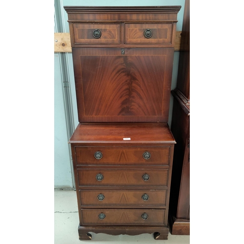 556 - A mahogany reproduction Secretaire with pull down writing slope, fitted interior, 4 long and two sho... 