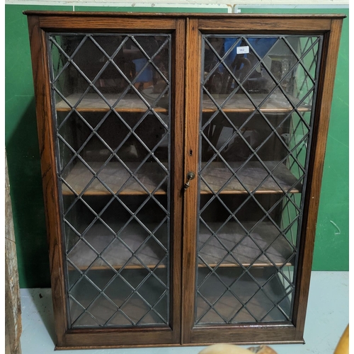 562 - An oak leaded glass display cabinet with three shelves, ht 128cm length 99cm ( top and base need res... 