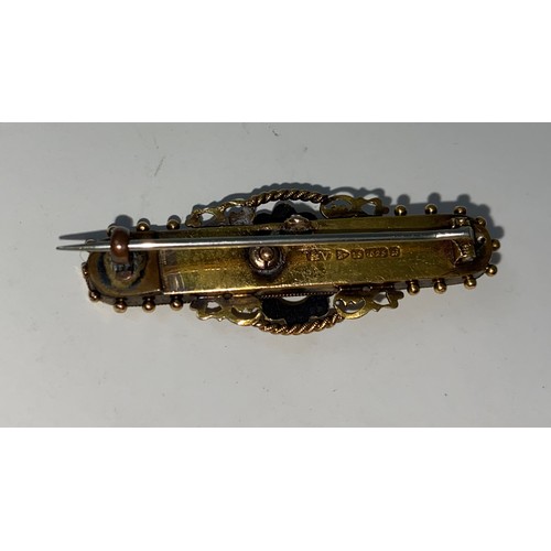 334 - An Edwardian 15 carat hallmarked gold Diamond and seed pearl brooch.Chester 1902 5gms