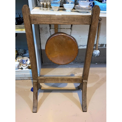 570 - An oval framed gong