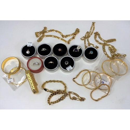 339 - Eight dress rings and a selection of costume jewellery