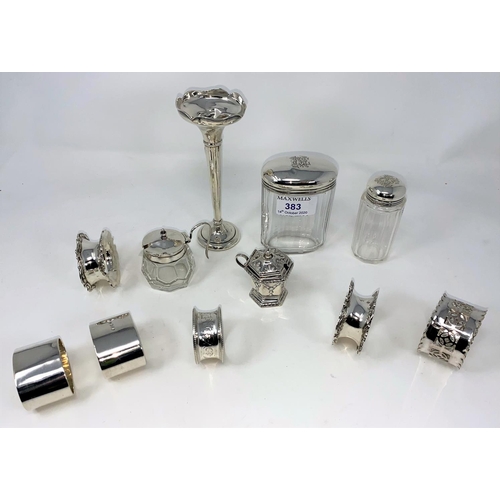 383 - Two pairs of hallmarked silver napkin rings; a hallmarked silver specimen vase; other small items of... 