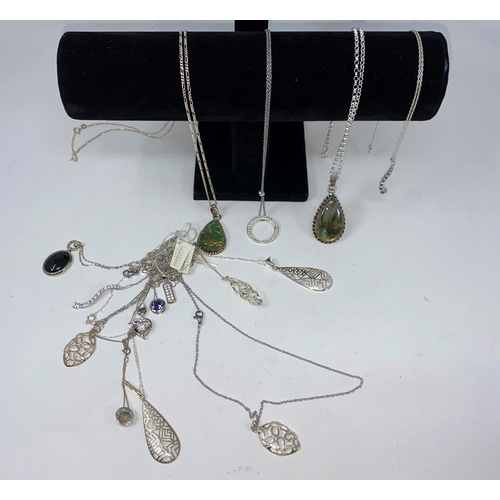 391 - A selection of pendants and chains, including 2 Swarovski, some stamped '925'