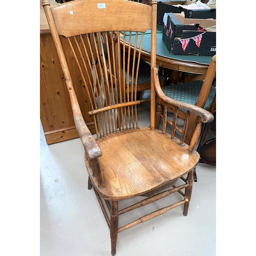 535 - A light wood stick back arm chair; a light oak tv stand