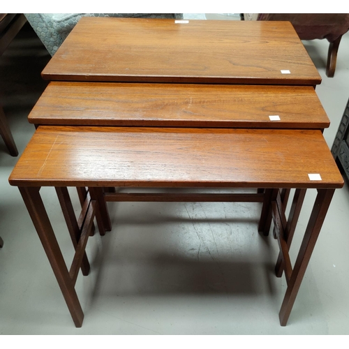 622 - A France & Son Danish teak nest of three plain rectangular tables. 60cm, 57cm & 54cm.