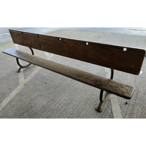 103A - A Victorian cast iron and wood 5 - seater convertible school desk / bench with hinged top and inkwel... 