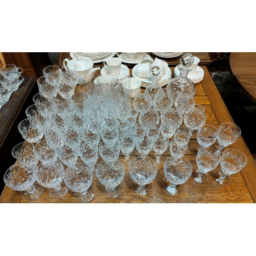 240A - A large part suite of Royal Doulton Georgian glasses, including decanters, Champagne glasses etc