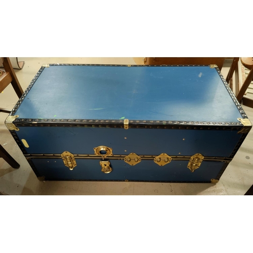 45A - A large blue metal bound cabin trunk