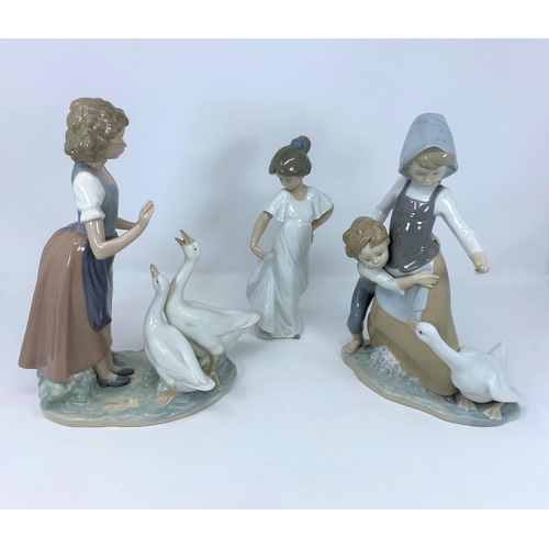 4 - A Lladro group of young boy and girl with goose; a Nao figure of girl with two geese and a single Na... 