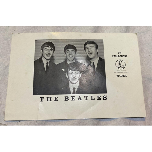518 - THE BEATLES - Parlophone Records publicity card bears autographs of the 4 Beatles in blue Biro to th... 