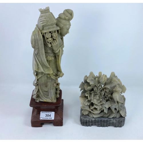304 - A pair of modern carved soapstone carvings:  female deity, and flowers and bird