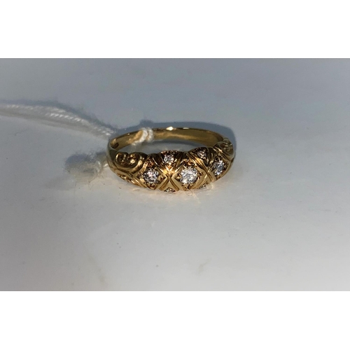 356 - A 9 carat hallmarked gold gypsy style ring set 7 diamond simulants, 3.3 gm