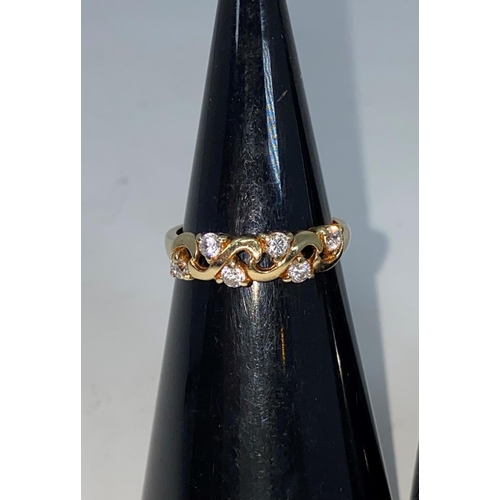 357 - A 9 carat hallmarked gold ring set marquise cut diamond simulant; a 9 carat hallmarked gold dress ri... 