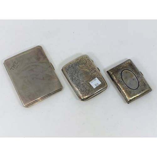384 - Three hallmarked silver cigarette cases, one engine turned and two chased, Birmingham 1941, 119 & 19... 