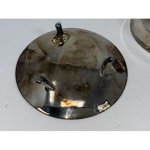 385 - A hallmarked silver small modernist pedestal bowl, Birmingham 1970; a similar shallow dish, Sheffiel... 