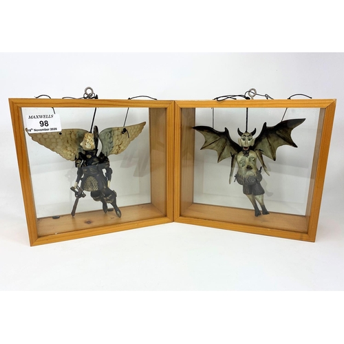 98 - An Italian pair of unusual grotesque puppets in individual display cases
20.5cm wide x 18.5cm high x... 