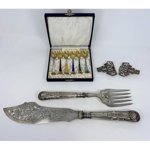 473 - A white metal nurses belt buckles, a boxed set of six enamel Danish silver tea spoons (some loss to ... 
