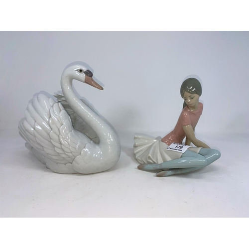 179 - A Lladro ballet dancer; a Lladro swan; dogs of Fo; other china