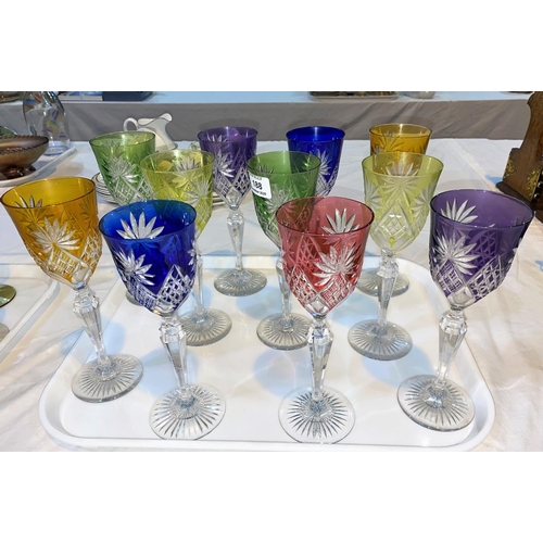 188 - Eleven overlaid coloured wine glasses