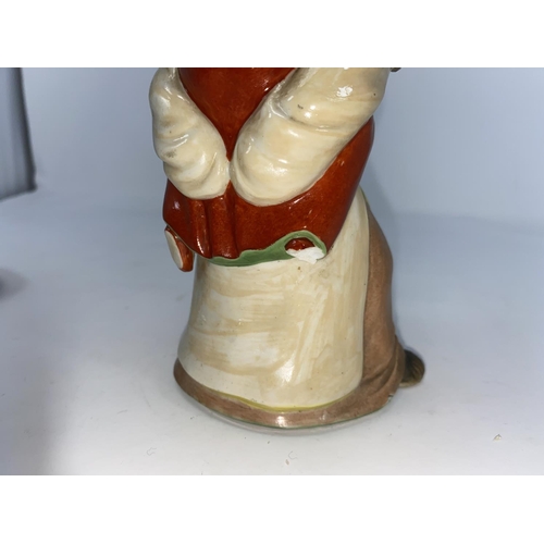 286 - A Chinese ceramic group , son carrying mother on his back (some areas of damage) on wooden stand (a.... 
