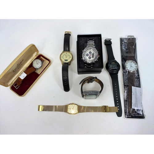 331 - A selection of gents watches; etc.