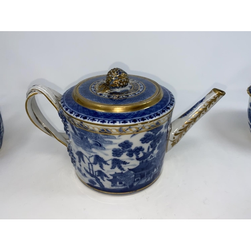 277 - Two blue and white Chinese export tea pots and similar lidded bowl decorated with gilt highlights (1... 