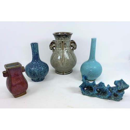 279 - A Chinese ceramic lobed and mottled blue vases with marks to base, a similar abstract item, seal mar... 