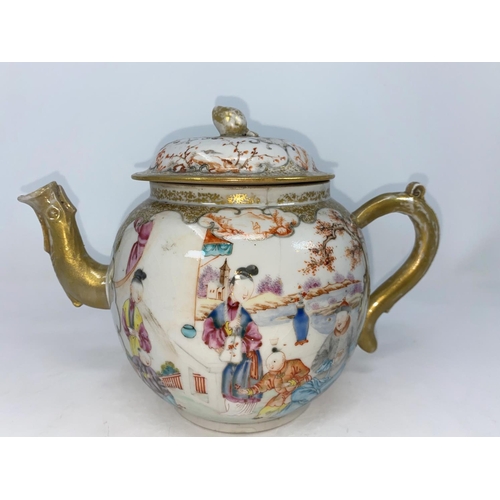 290a - A Chinese tea pot decorated with various traditional scenes with highlights of gilt decoration (hair... 