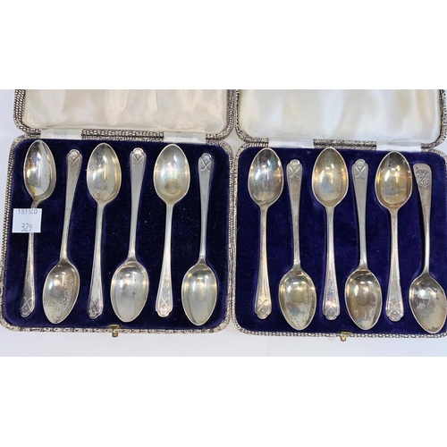 329 - Twelve hallmarked silver golfing teaspoons, cased, various dates