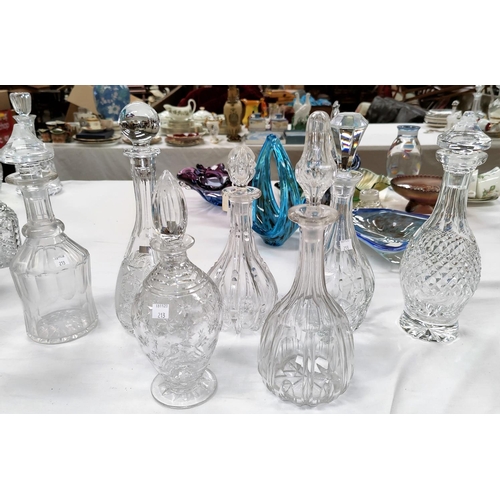 213 - Eight various cut decanters