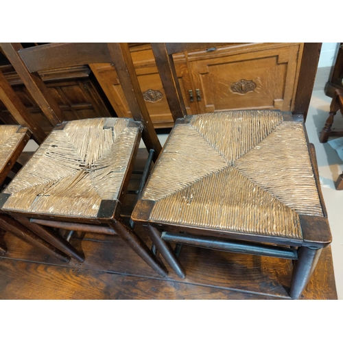 490 - A 19th century set of 6 chapel chairs with rush seats