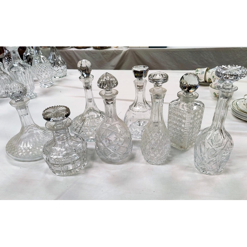214 - Eight various cut decanters