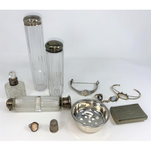 408 - A small hallmarked strainer dish 1.25oz diameter; a slice cut glass double ended scent flask with si... 