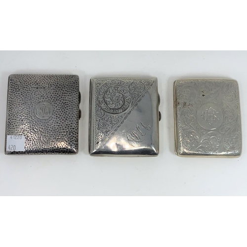 420 - 2 chased and monogrammed hallmarked silver cigarette cases Chester 1908 & Birmingham 1911
(one dente... 