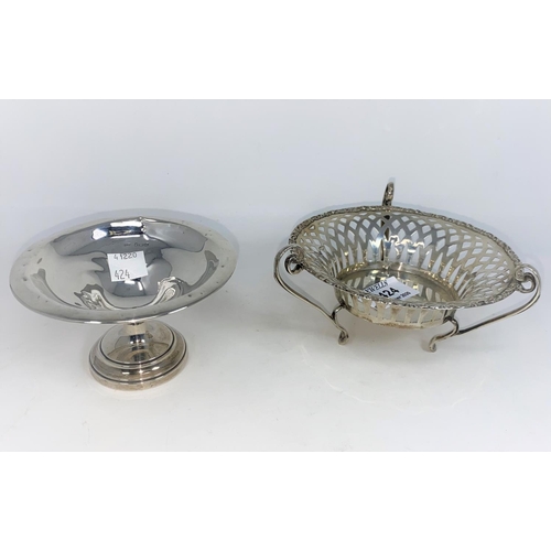 424 - A circular pierced hallmarked silver bon bon dish with 3 scroll mounts, Chester 1907 3oz; a weighted... 