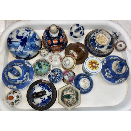 273 - A large collection of Chinese vase lids, various shapes and sizes