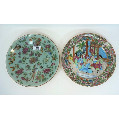 282 - A Chinese pair of shallow dishes in the famille verte manner on celadon ground, diameter 25 cm
