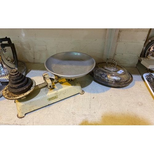 344 - A silver plated oval entree dish with floral decoration; a set of vintage kitchen scales by Harper