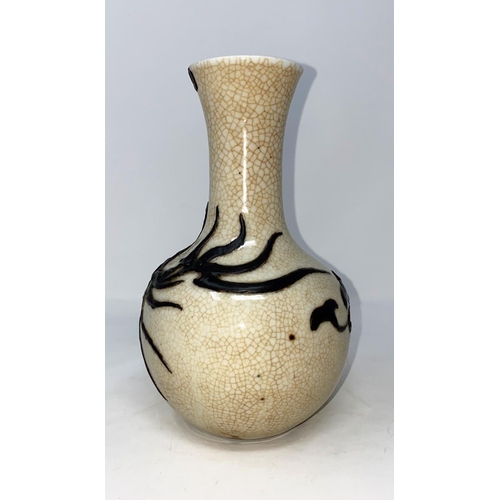 311a - A Japanese crackle glaze vase with dripware decoration