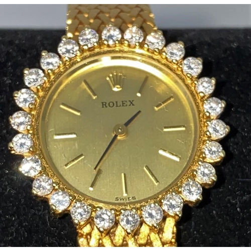 436 - An 18 carat gold Rolex dress watch fitted with factory set diamond to the bevel (26 in total) with w... 