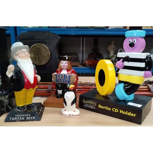 134 - 4 advertising mascots - a Carltonware Guinness penguin, Toby Bitter Youngers and Bertie Bassett figu... 