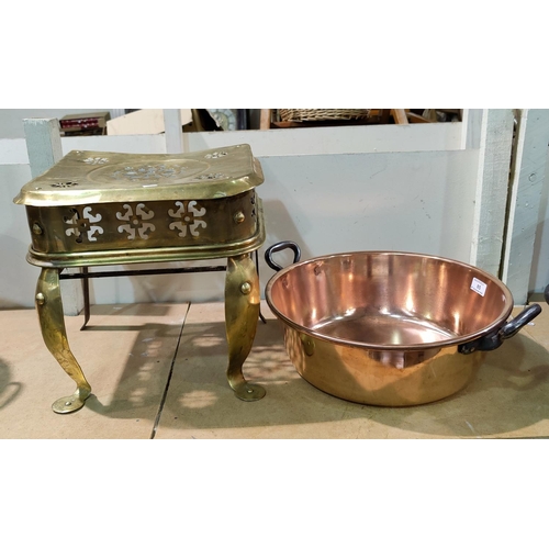 85 - A 19th century copper jam pan; a brass footman