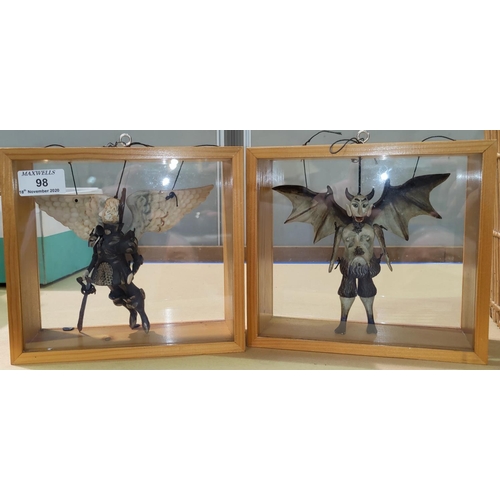 98 - An Italian pair of unusual grotesque puppets in individual display cases
20.5cm wide x 18.5cm high x... 