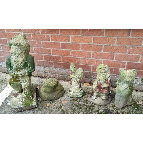 27 - Four reconstituted stone garden ornaments:  gnome; cat; etc.