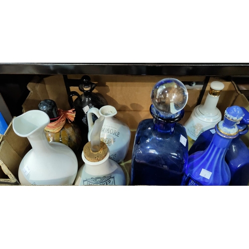 3 - A selection of branded pottery decanters; etc.