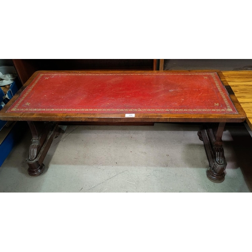 506 - A reproduction mahogany coffee table with leather top; a similar drop leaf table
